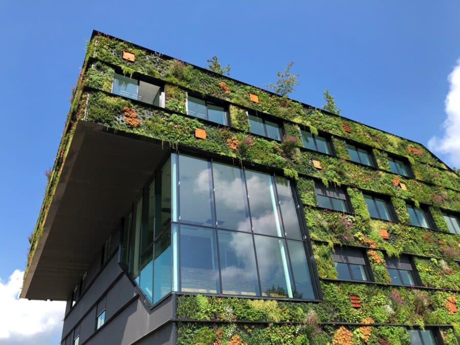 College campus building covered in plants outside and in at Aeres Hogeschool Almere scaled e1708977921819